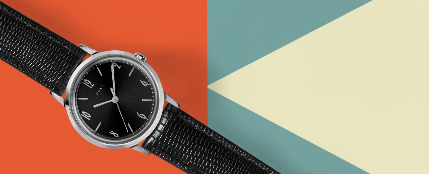 Marlin with black leather strap and black and sliver dial